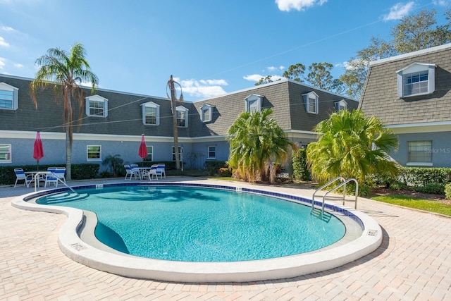 view of pool with a patio area