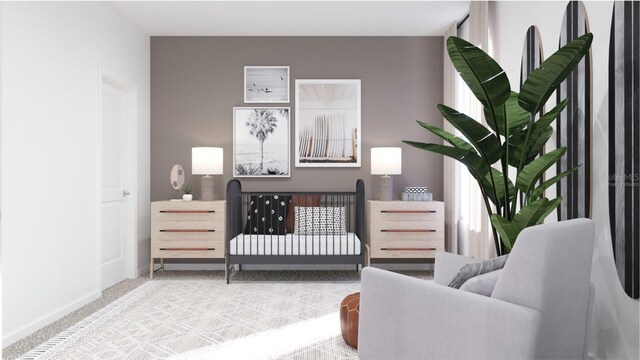 carpeted bedroom with a nursery area