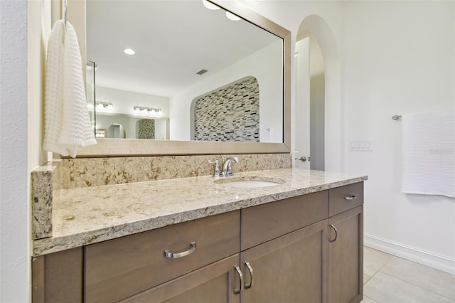 bathroom with vanity and tile patterned floors