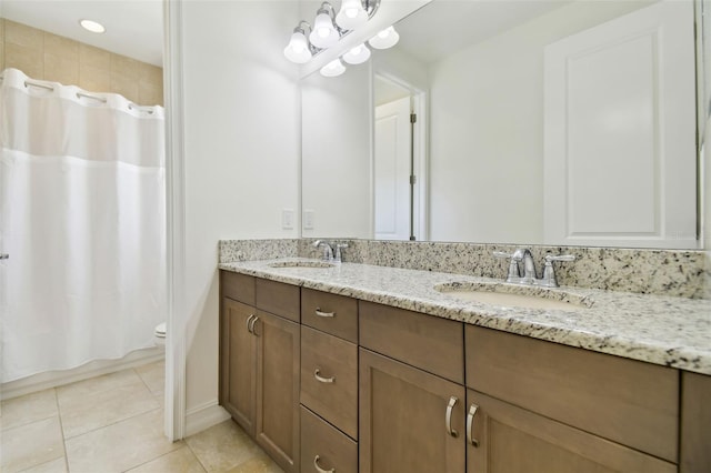 full bathroom with toilet, vanity, shower / tub combo, and tile patterned floors