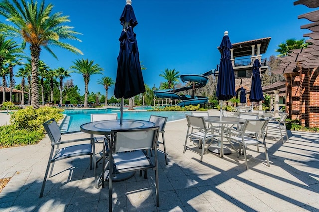 view of patio featuring a community pool