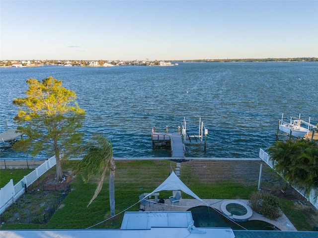 dock area with a water view and central air condition unit