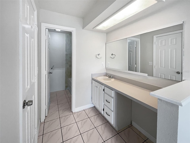 bathroom with tile patterned floors and vanity