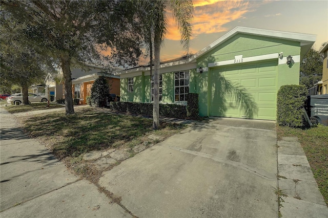 ranch-style home with a garage