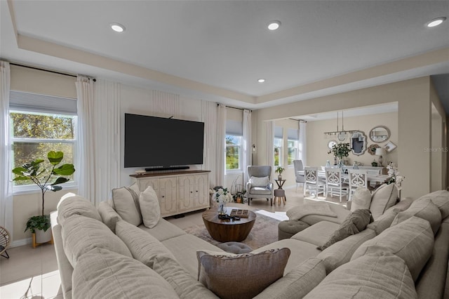 tiled living room featuring plenty of natural light