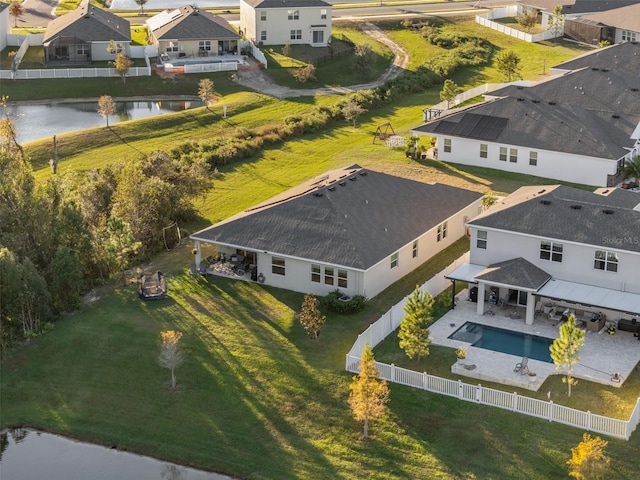 birds eye view of property featuring a water view