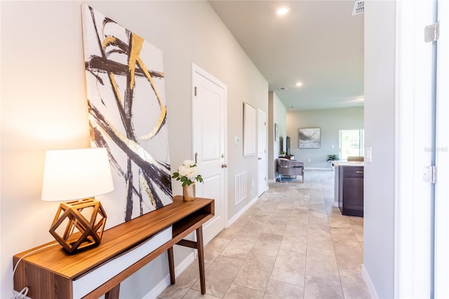 174 Green Oak Park, Rotonda West, FL 33947 - hallway featuring recessed lighting and baseboards