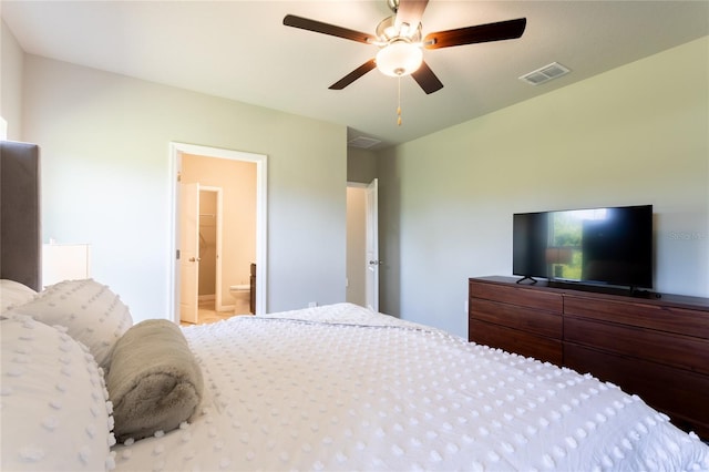 bedroom with ceiling fan and connected bathroom