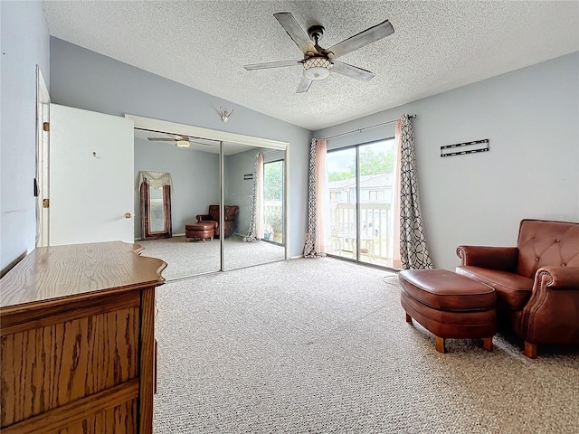 6262 93rd Ter N Unit 3904, Pinellas Park, FL 33782 - sitting room featuring ceiling fan, carpet floors, and a textured ceiling