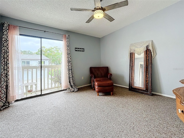 6262 93rd Ter N Unit 3904, Pinellas Park, FL 33782 - sitting room featuring carpet floors, a textured ceiling, and ceiling fan