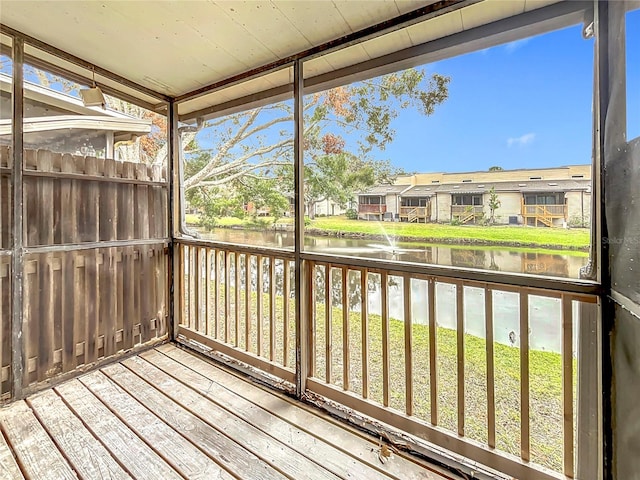 6262 93rd Ter N Unit 3904, Pinellas Park, FL 33782 - unfurnished sunroom featuring a water view