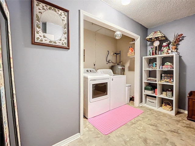 6262 93rd Ter N Unit 3904, Pinellas Park, FL 33782 - laundry room with washer and clothes dryer and a textured ceiling