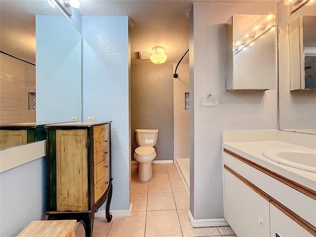 6262 93rd Ter N Unit 3904, Pinellas Park, FL 33782 - bathroom with tile patterned flooring, vanity, and tiled shower
