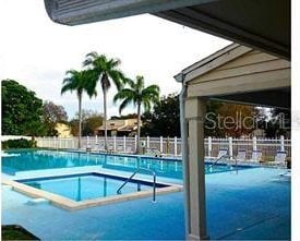community pool with fence