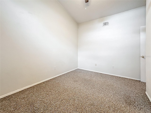 unfurnished room with baseboards, carpet flooring, a ceiling fan, and a textured ceiling