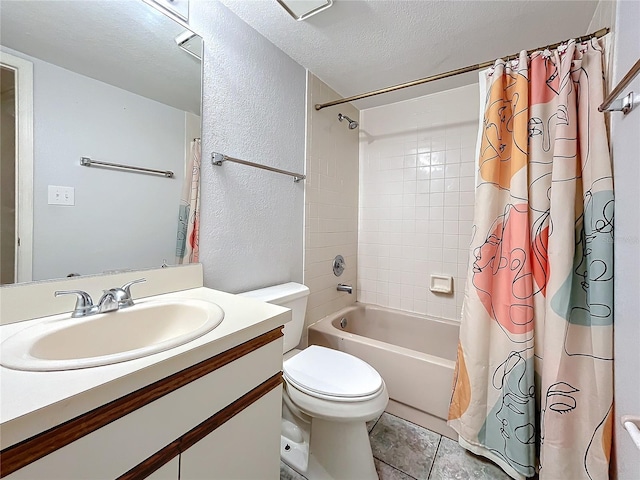 bathroom featuring toilet, shower / tub combo with curtain, vanity, a textured ceiling, and tile patterned floors