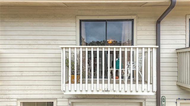 doorway to property featuring a balcony