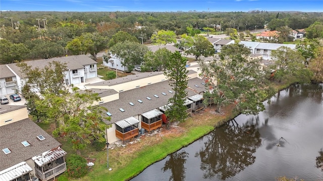 aerial perspective of suburban area with a large body of water