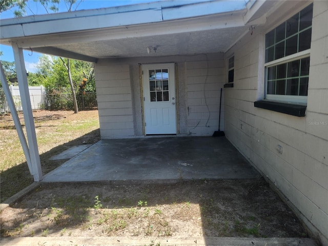 11608 Zimmerman Rd, Port Richey, FL 34668 - view of exterior entry featuring a carport
