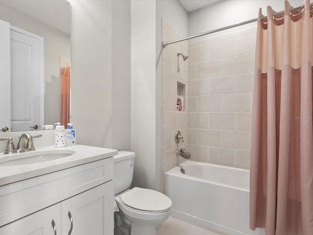 full bathroom with vanity, shower / bath combo, and toilet