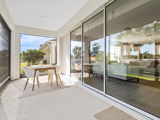 sunroom featuring a healthy amount of sunlight