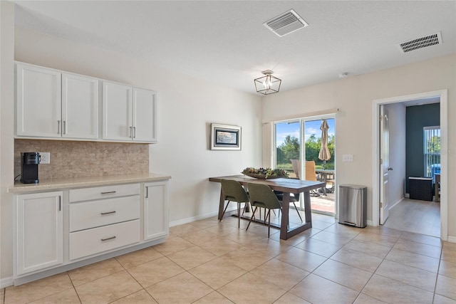 dining room featuring light tile patterned flooring