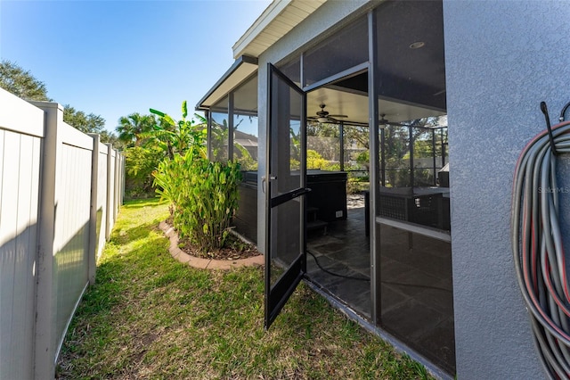 view of yard featuring a sunroom