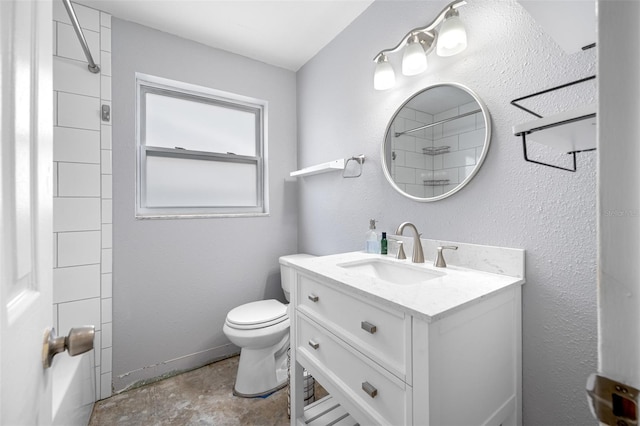 full bathroom with vanity, shower / bath combination, and toilet