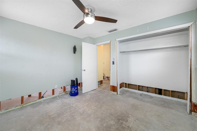 unfurnished bedroom with a closet and ceiling fan