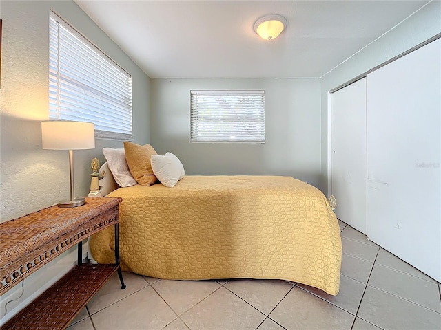 bedroom with tile patterned flooring