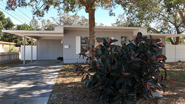 view of front of house featuring a carport