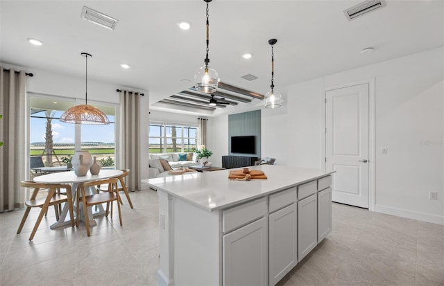 kitchen featuring a center island and hanging light fixtures