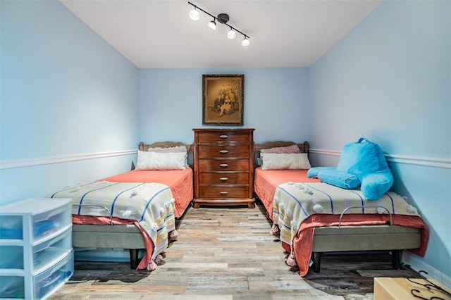 bedroom featuring light hardwood / wood-style floors