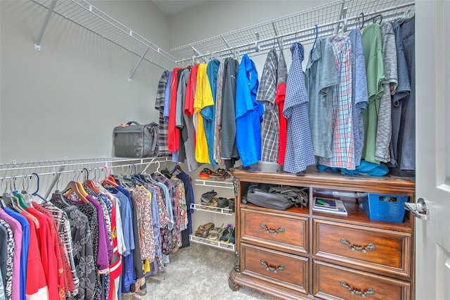 spacious closet with carpet flooring