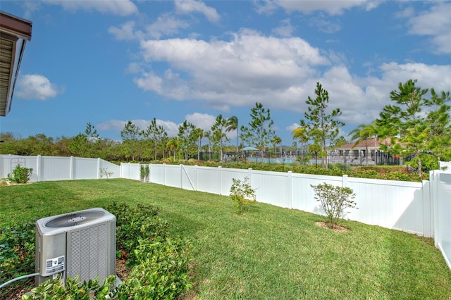 view of yard featuring central AC