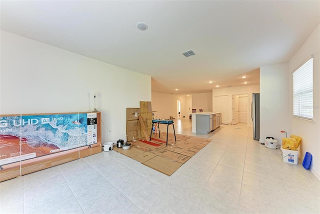 interior space featuring light tile patterned flooring