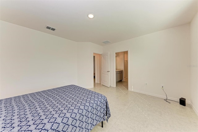 bedroom featuring connected bathroom