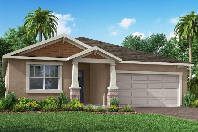 view of front of house featuring a porch, a garage, and a front yard