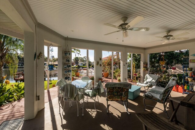 view of patio featuring ceiling fan