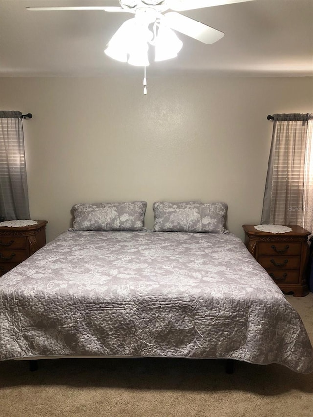 bedroom with carpet flooring and ceiling fan