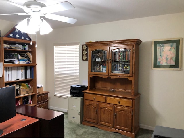 office space featuring light colored carpet and ceiling fan