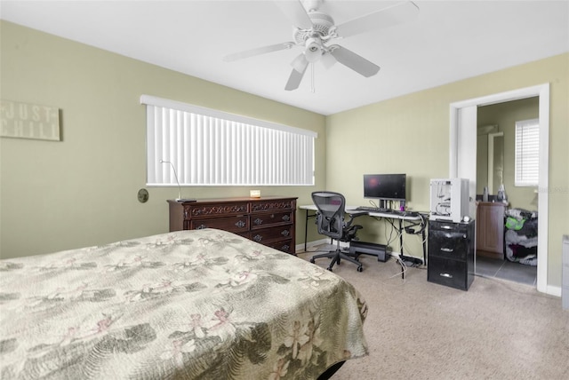 bedroom featuring ceiling fan and light colored carpet