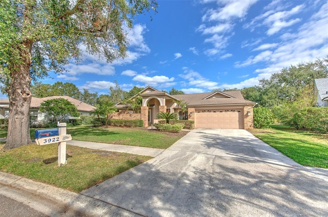 view of front facade featuring a front yard and a garage