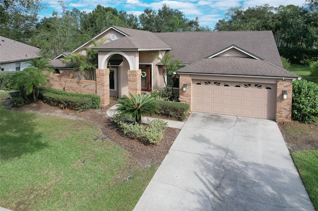 single story home with a garage