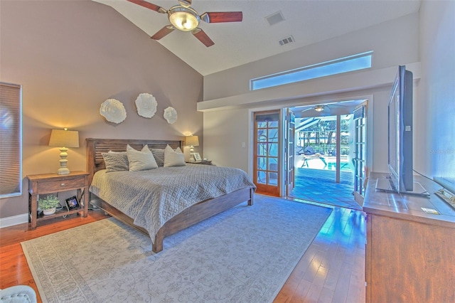 bedroom with wood-type flooring, access to outside, high vaulted ceiling, and ceiling fan