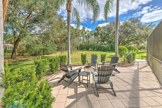 view of patio featuring a fire pit