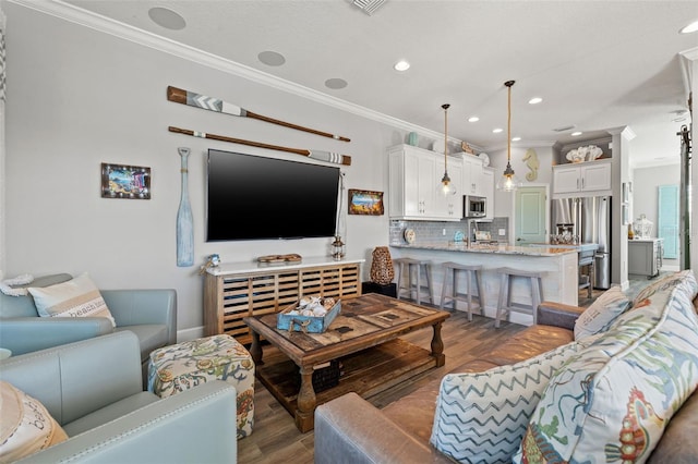 living room featuring crown molding and dark wood-type flooring