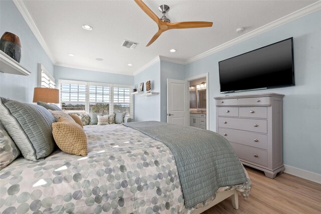 bedroom with ceiling fan, light hardwood / wood-style floors, ensuite bathroom, and crown molding