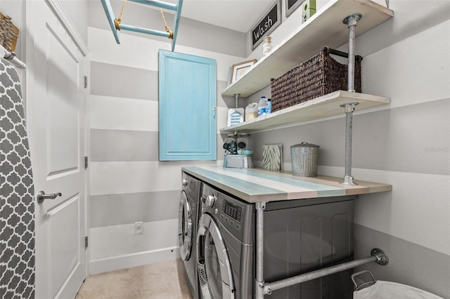 laundry room featuring washing machine and dryer