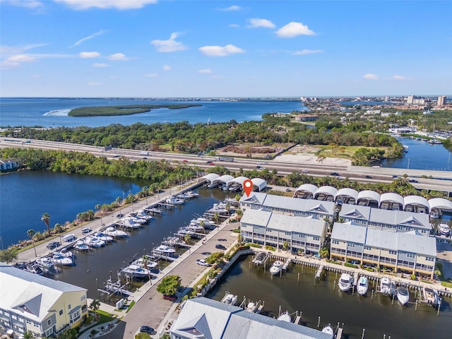 birds eye view of property featuring a water view